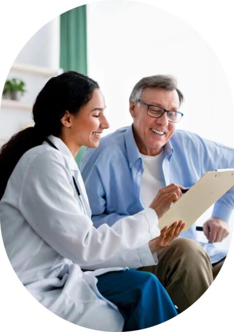 Physician and patient reviewing care information together